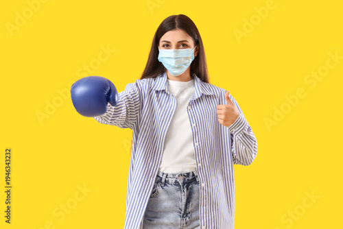 Young woman in medical mask...