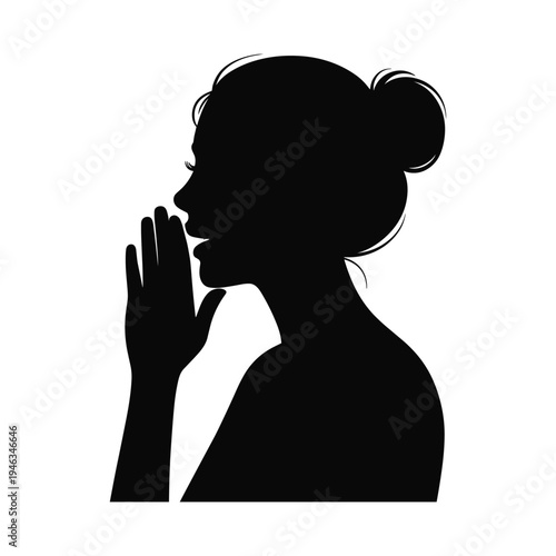 Woman whispering secret with hand over mouth silhouette