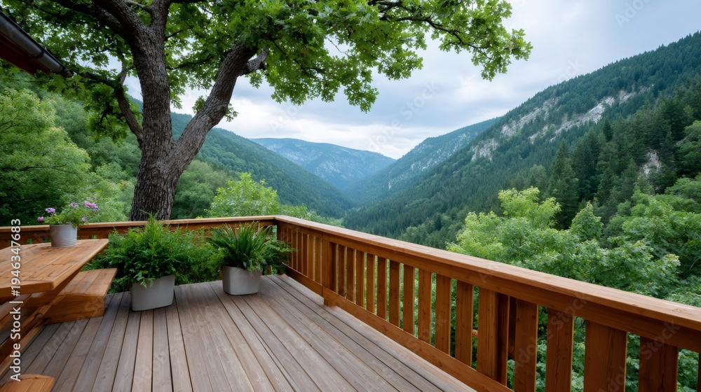 Fototapeta premium Wooden deck overlooking green mountain valley and forest