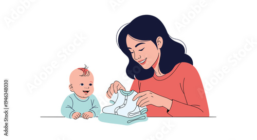 Loving mother smiling while folding tiny baby clothes with her cute infant sitting nearby in a heartwarming scene of early parenthood.