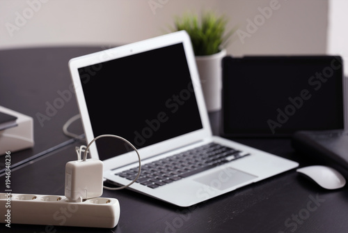 Modern laptop with tablet a...
