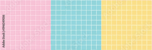 Pastel colored grid of square tiles in pink, blue, and yellow sections background texture