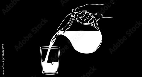 Hand pouring milk into glass.