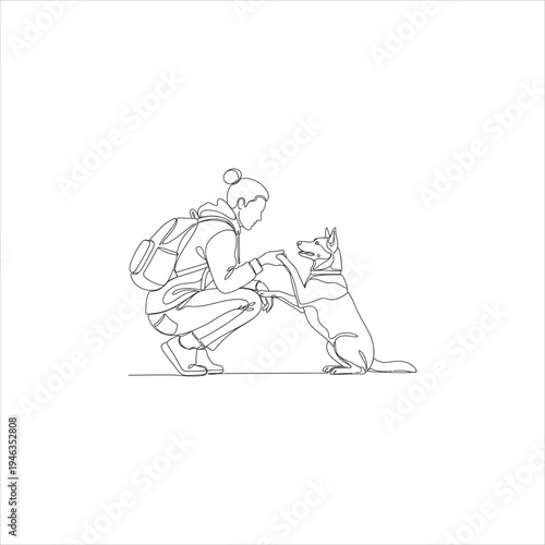 A person and a dog shake hands