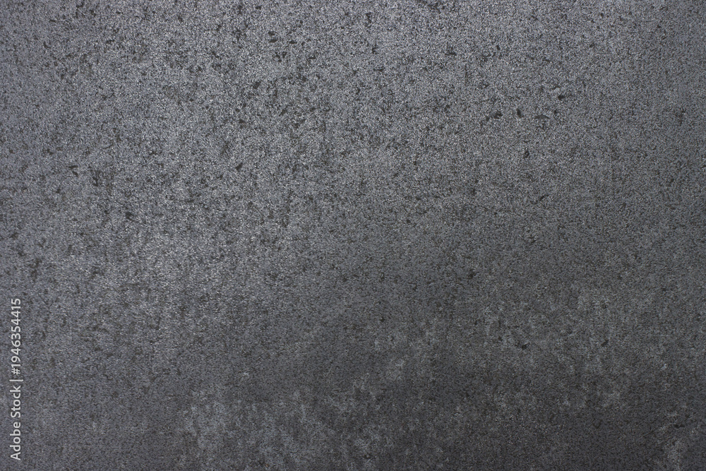 Obraz premium Granite surface shows rough, dark texture