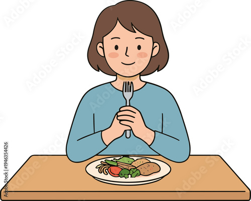 Woman sitting at table happily holding fork and knife to eat a plate of healthy food