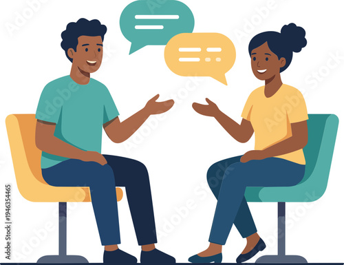 Two people having a conversation sitting on chairs indoors