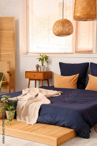 Interior of light bedroom w...