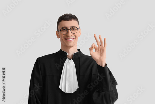 Male judge in eyeglasses sh...