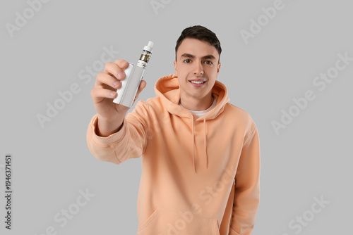 Young man with electronic c...