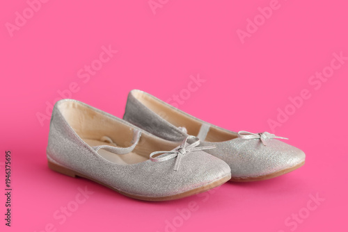 Cute girl's shoes on pink b...