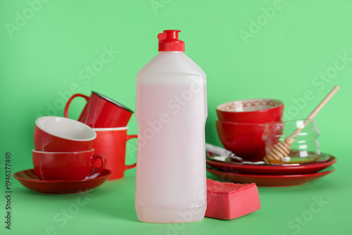 Dirty dishes, pink detergen...