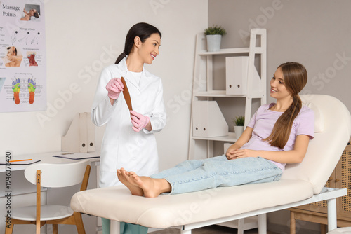 Female orthopedist showing ...