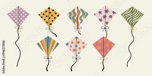 A collection of colorful diamond shaped kites floating on strings