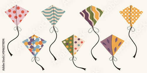 A collection of colorful diamond shaped kites with patterned designs