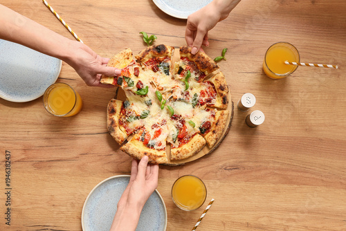 Hands taking slices of tast...