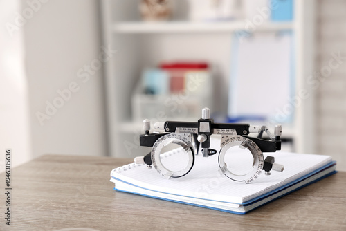 Ophthalmic trial frame with...