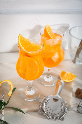 Glasses of Aperol spritz co...