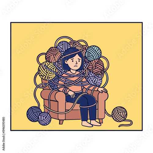 A child sits on a couch surrounded by tangled yarn balls.