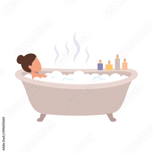 Woman relaxing in a bubble bath with candles on the edge