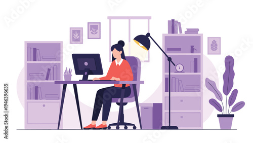 Young professional woman working on computer at her home office desk surrounded by bookshelves and a modern floor lamp.