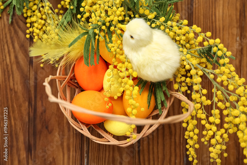 Easter eggs in basket and c...