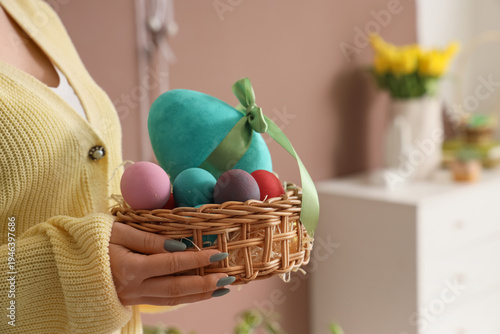 Woman with wicker basket of...
