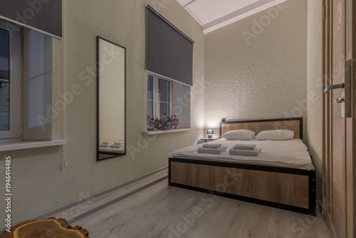 Compact Budget Hotel Room with Double Bed and Modern Amenities
