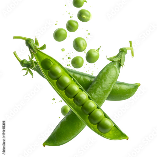 Fresh green peas in a pod, with some peas falling gracefully