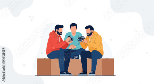 Three friends with cameras sitting on cardboard boxes, discussing photography