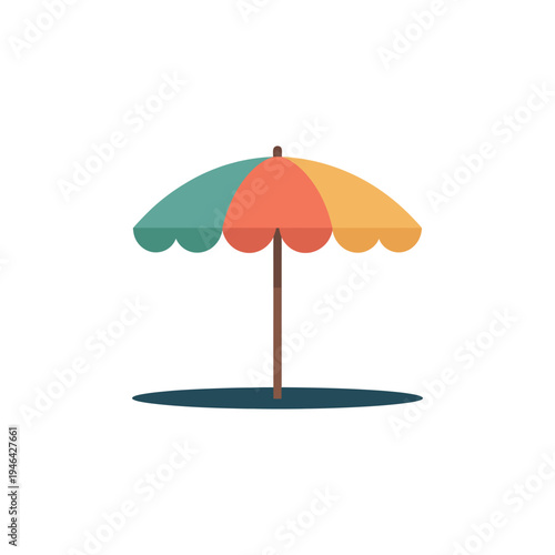 Brightly colored beach umbrella providing cool shade on a sunny day