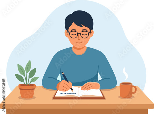 Man sitting at desk writing in notebook with plant and coffee