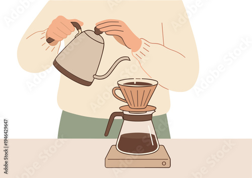 Person pouring water into a pour-over coffee maker on a table indoors
