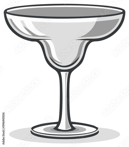 Clear coupe glass for cocktails on a simple background