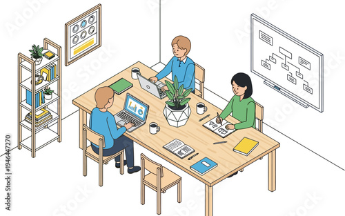 Focused coworkers performing tasks at shared wooden desk in office