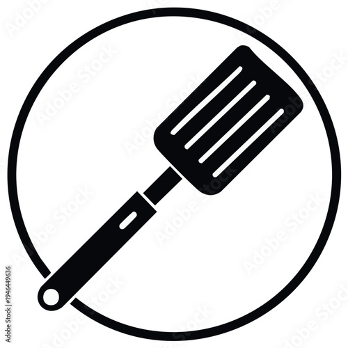 Kitchen Utensil Spatula Icon in a Circle Silhouette