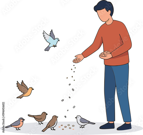 Man feeding birds in park with seed from hand
