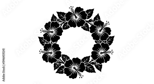 Black floral wreath with white flowers.