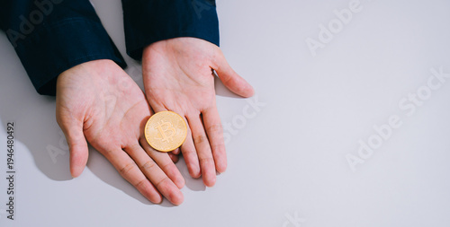 Golden coin Hand Palm Currency Finance Investment Digital currency Cryptocurrency Money Wealth Business Economy Finance concept Savings Token