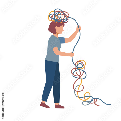 A woman untangles colorful wires on her head standing indoors