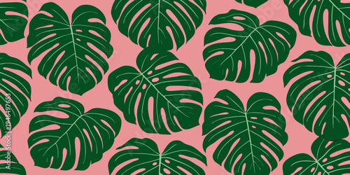 Seamless pattern of vibrant green monstera leaves on a pink background