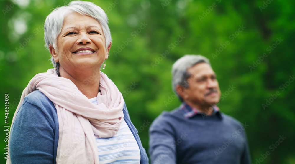 Obraz premium Smile, old woman or couple in park with holding hands, healthy relationship or bonding on weekend break. Bokeh, portrait or senior people with space, connection or romantic moment on retirement date.