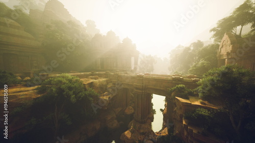 Fotografie sunlit canyon landscape with stone bridge, golden mist and river reflection under warm dawn light