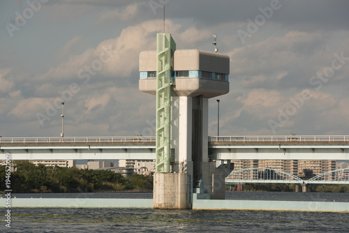 Wallpaper Mural river water control gate structure under a cloudy sky Torontodigital.ca