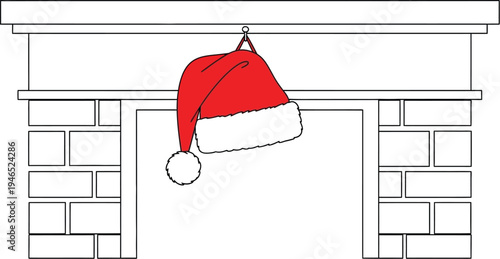 A red Santa hat with white trim hangs on a mantle