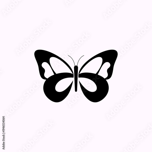 Vector illustration of a black geometric butterfly with a flat design. A symmetrical abstract butterfly isolated on a light background