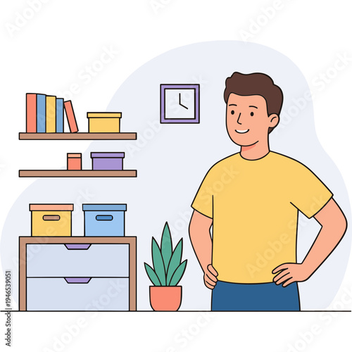 A man stands confidently in a room with bookshelves and storage boxes