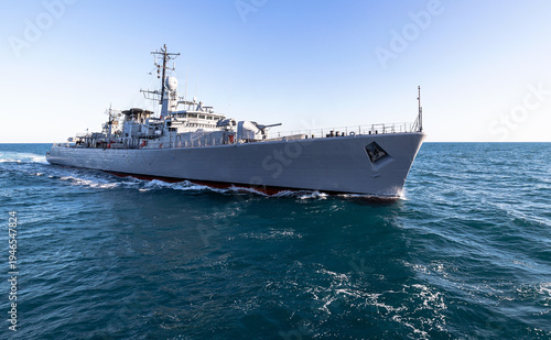 Navy ship patrolling the sea during military operation.