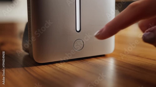 Sleek modern smart home device on a wooden table indoors