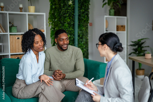 Photography Young couple consulting financial adviser for future planning